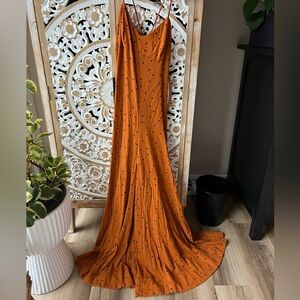 XS orange polka dot romper